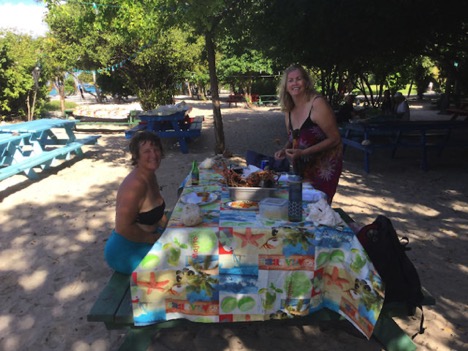 Crew Susan and Jen enjoying a lobster feast